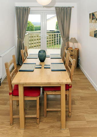 Great dining area with doors to patio